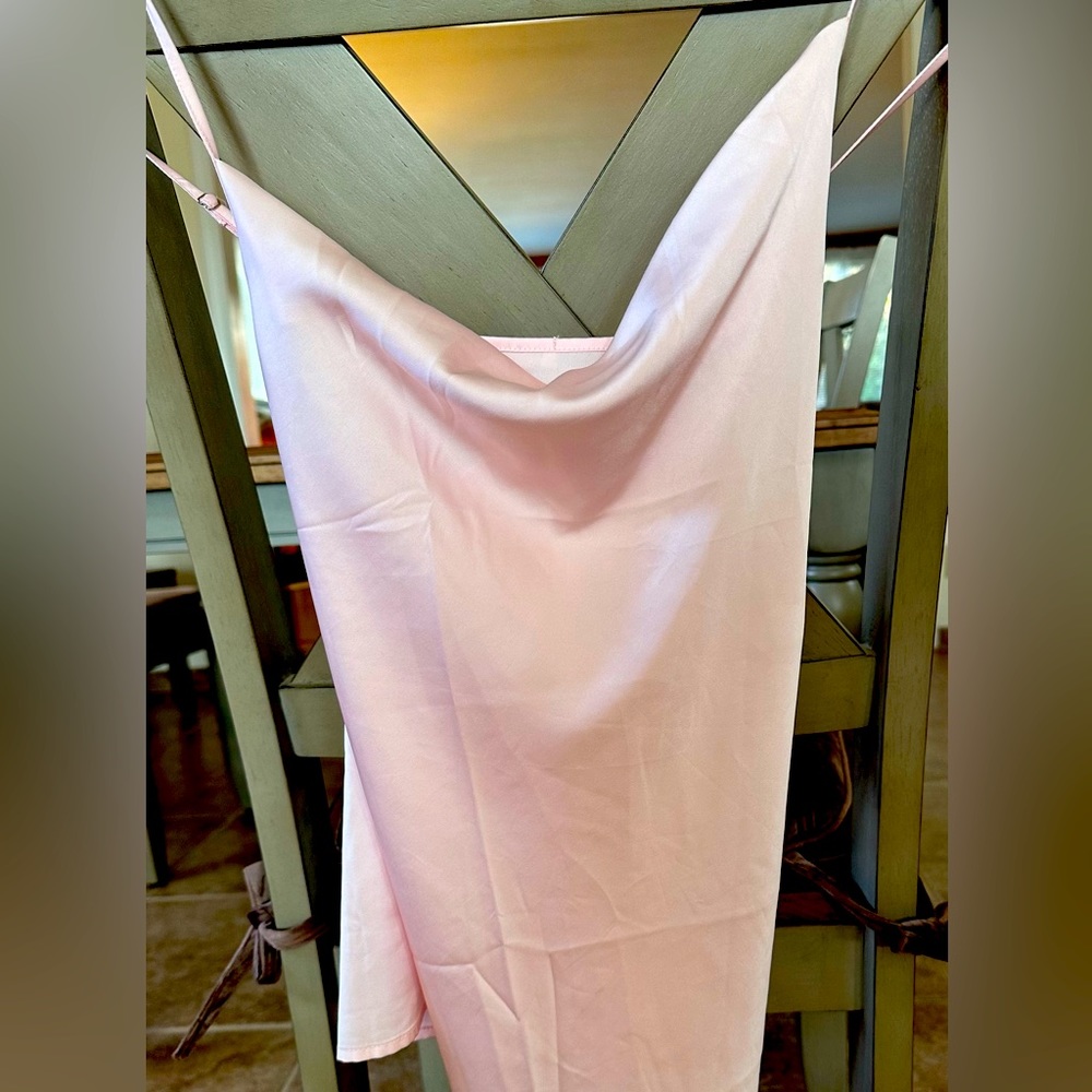 Silky baby pink camisole.